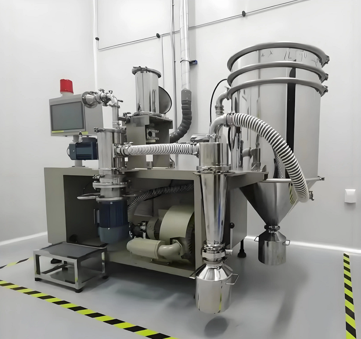 fluidized bed jet mill on table.png fluidized bed jet mill on table.png